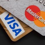 SoFi, Mastercard partner on stablecoin settlement as Visa expands Bridge card program